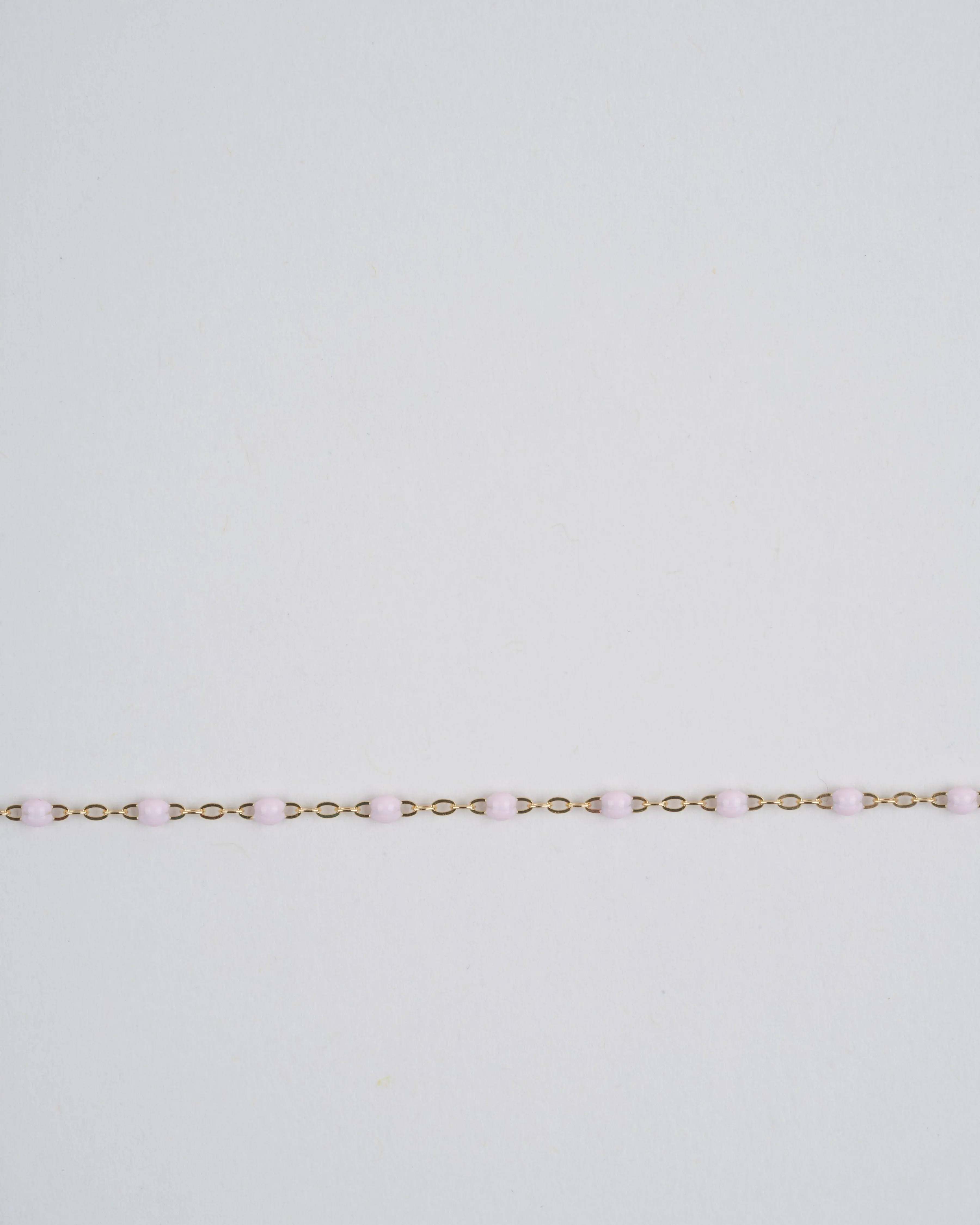 baby pink bead bracelet - yellow gold