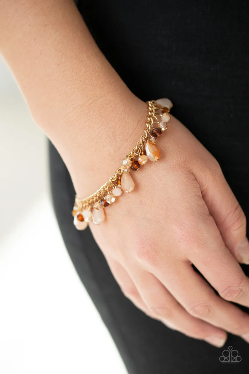 Catwalk Crawl Gold Paparazzi Bracelet