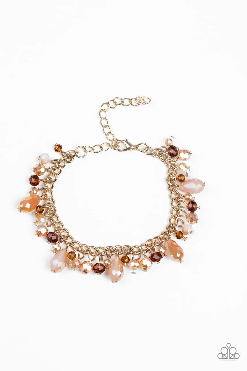 Catwalk Crawl Gold Paparazzi Bracelet