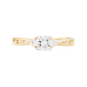 Contemporary Three Stone Diamond Engagement Ring in 18 Karat Yellow Gold