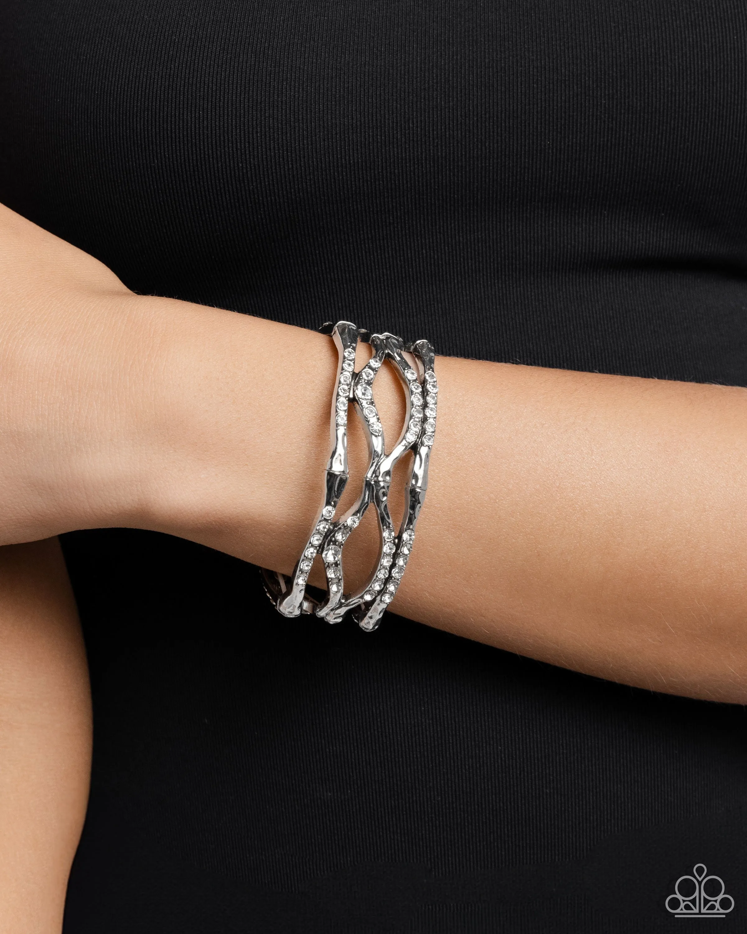 Cross Country - White - Rhinestone Encrusted Asymmetrical Bar Paparazzi Hinge Bracelet