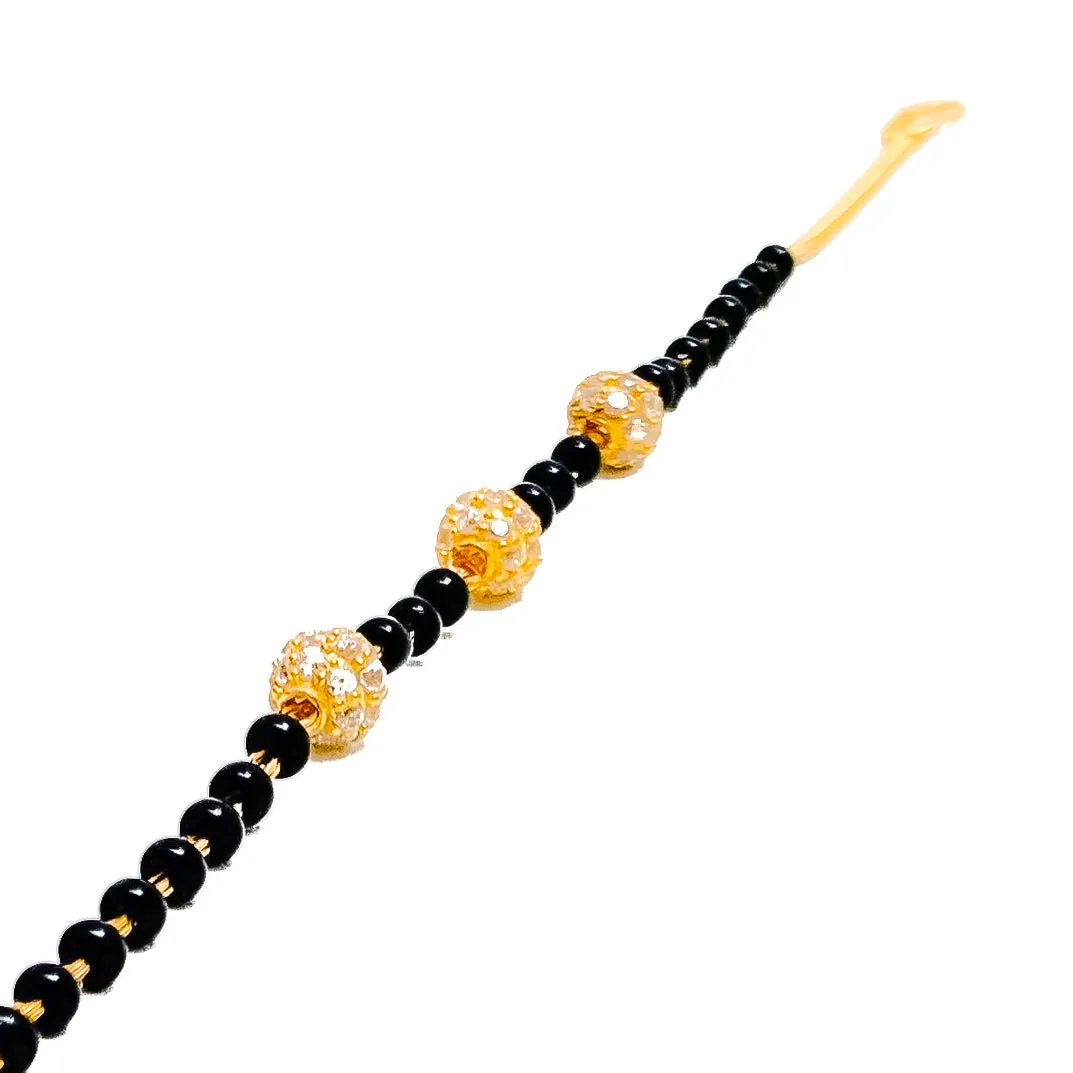 Elegant Orb 22k Gold Black Bead Bracelet