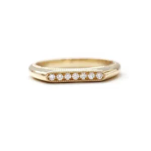Elongated oval pave set diamond signet band