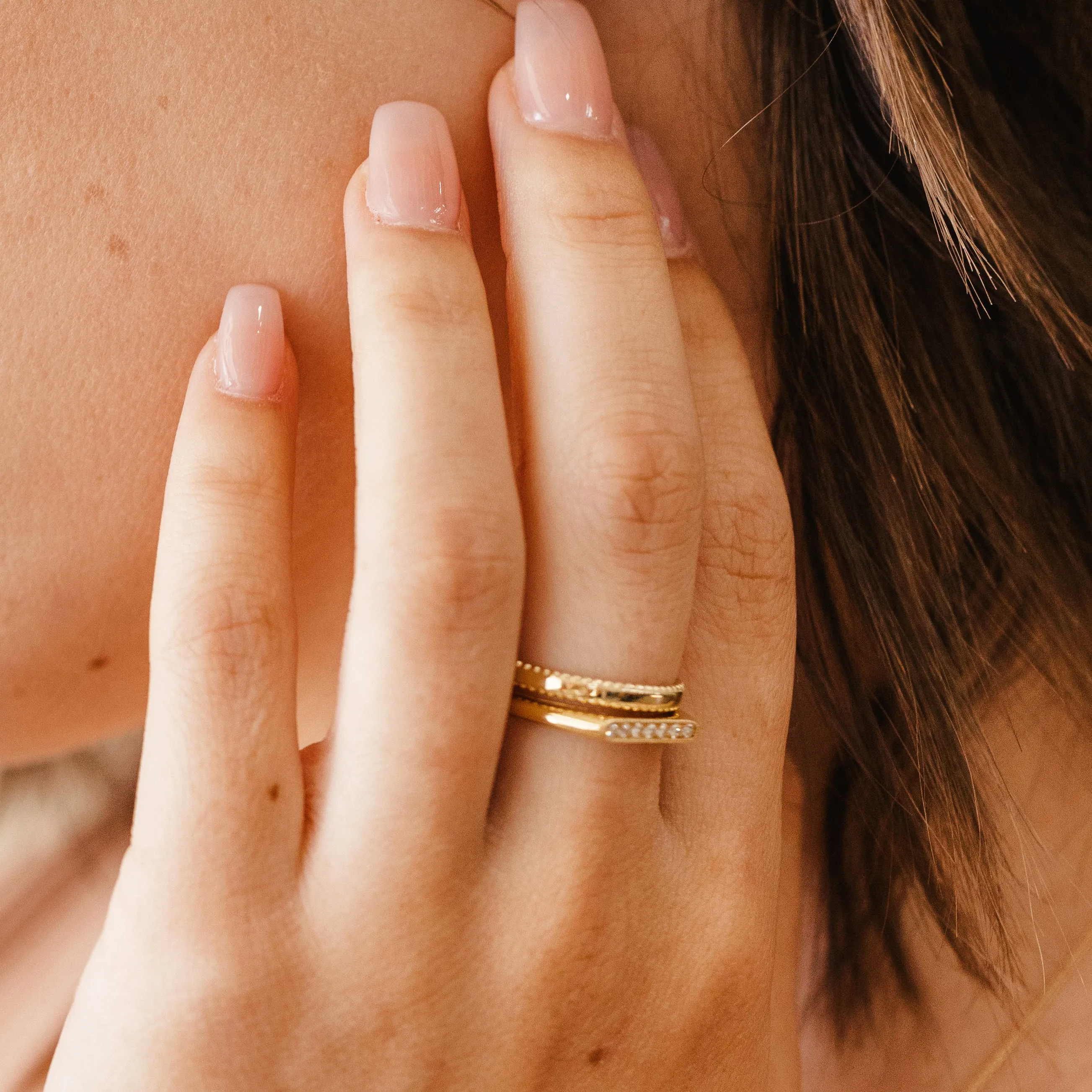 Elongated oval pave set diamond signet band