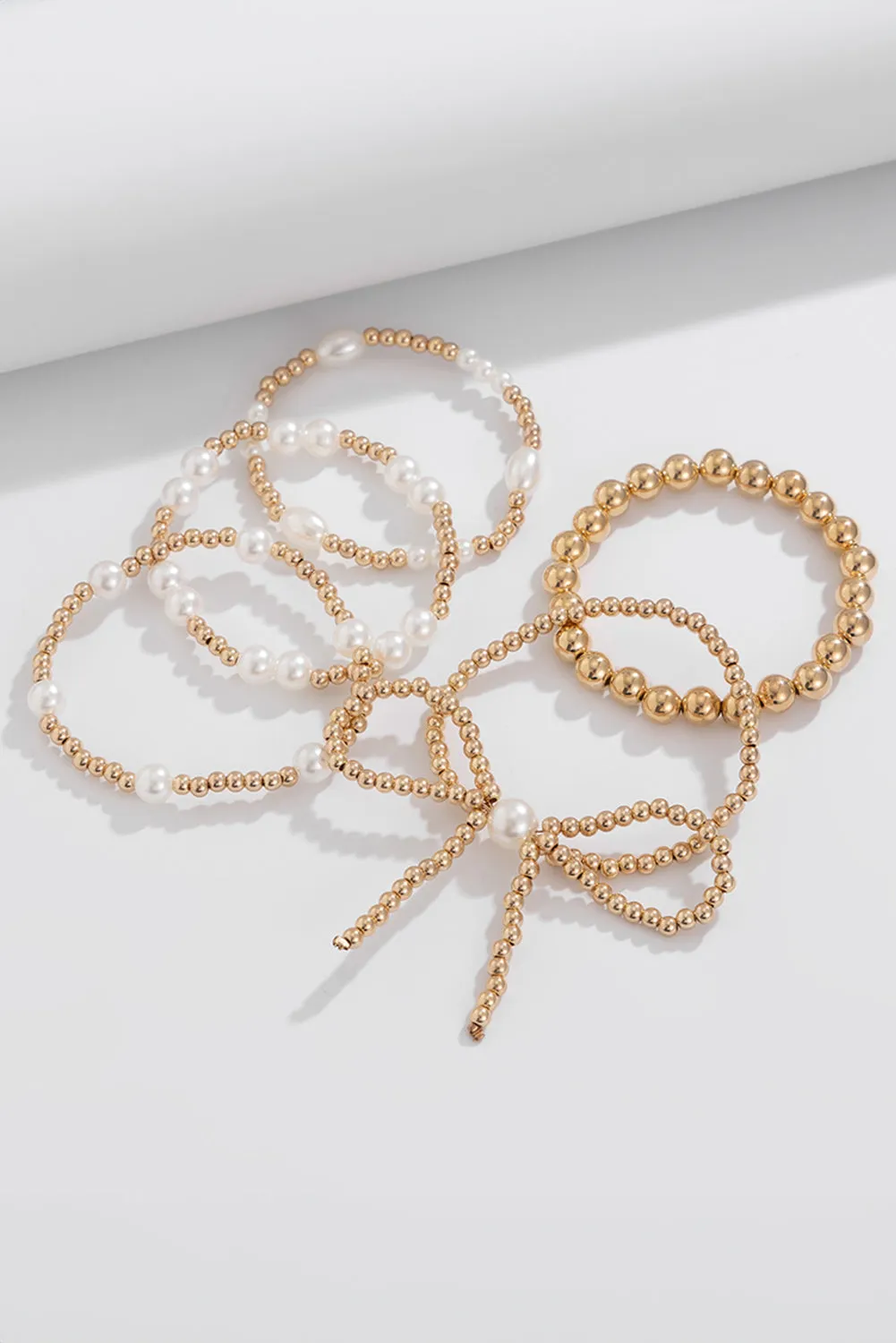 Gold Bow Multi Layered Bracelet Set
