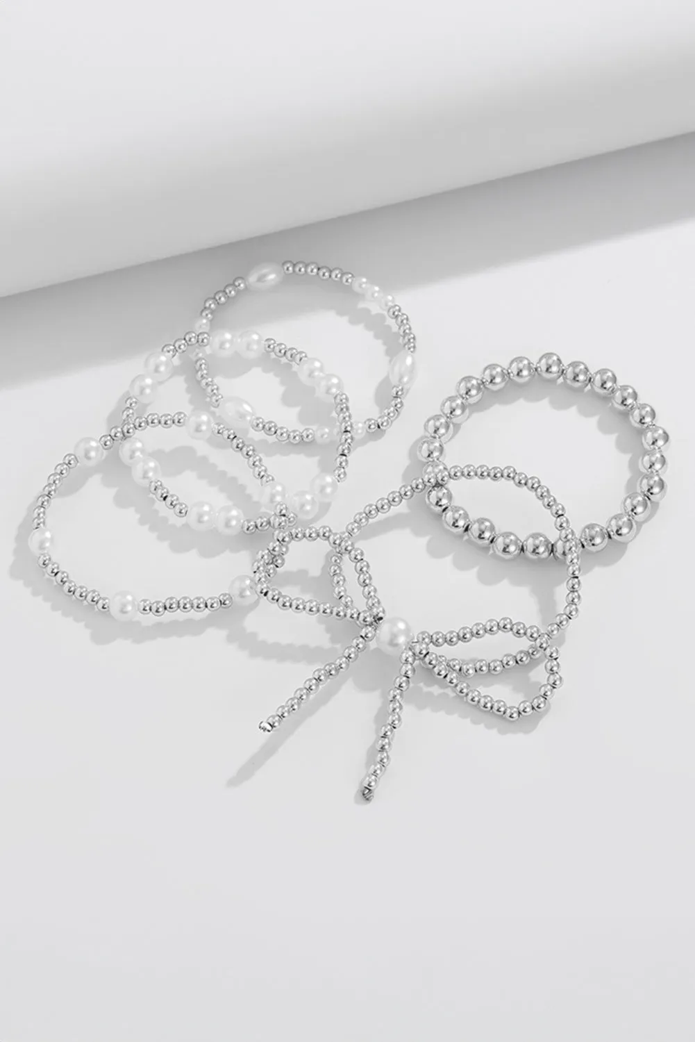 Gold Bow Multi Layered Bracelet Set