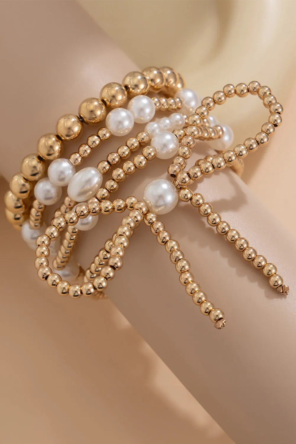 Gold Bow Multi Layered Bracelet Set