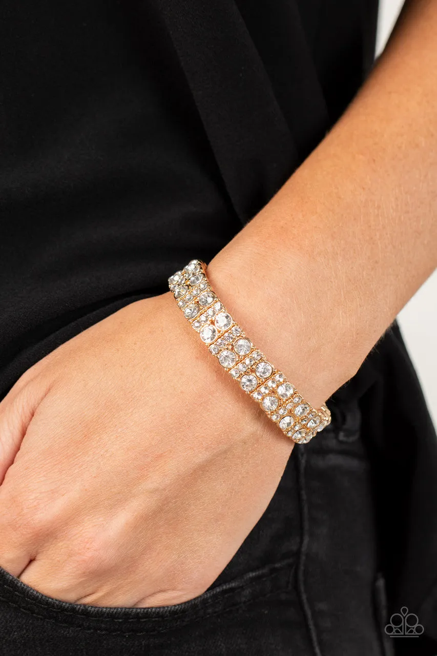 Mic Dropping Drama - Gold - White Rhinestone Bling Paparazzi Stretchy Bracelet