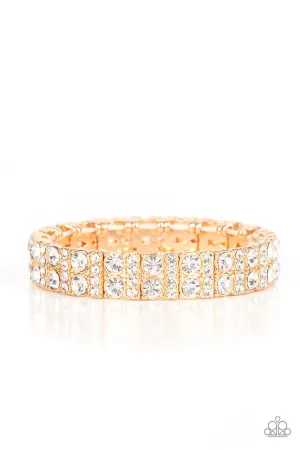 Mic Dropping Drama - Gold - White Rhinestone Bling Paparazzi Stretchy Bracelet