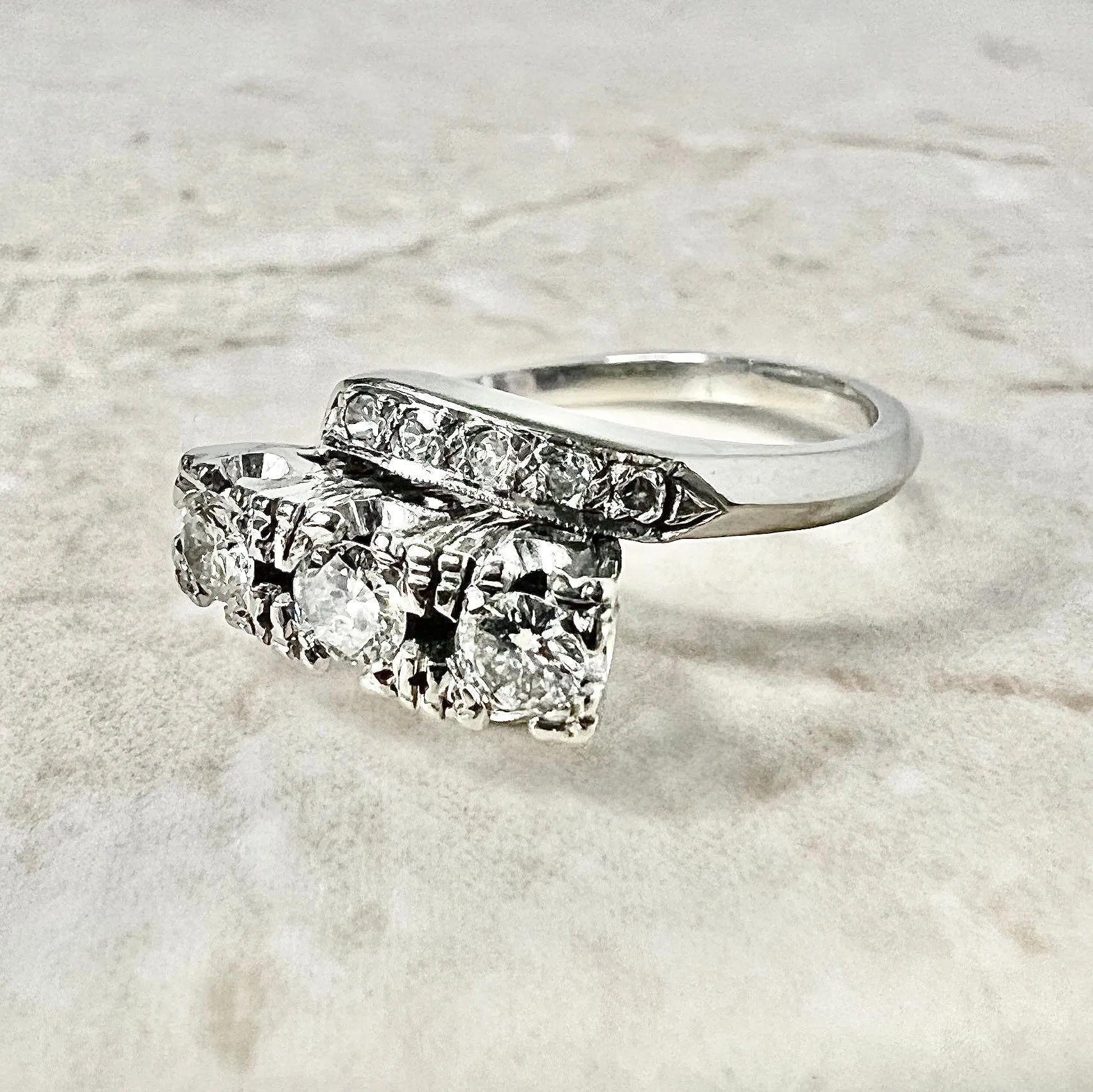 Vintage 1940’s 14 Karat White Gold 0.65 Carat Diamond Three-Stone Ring