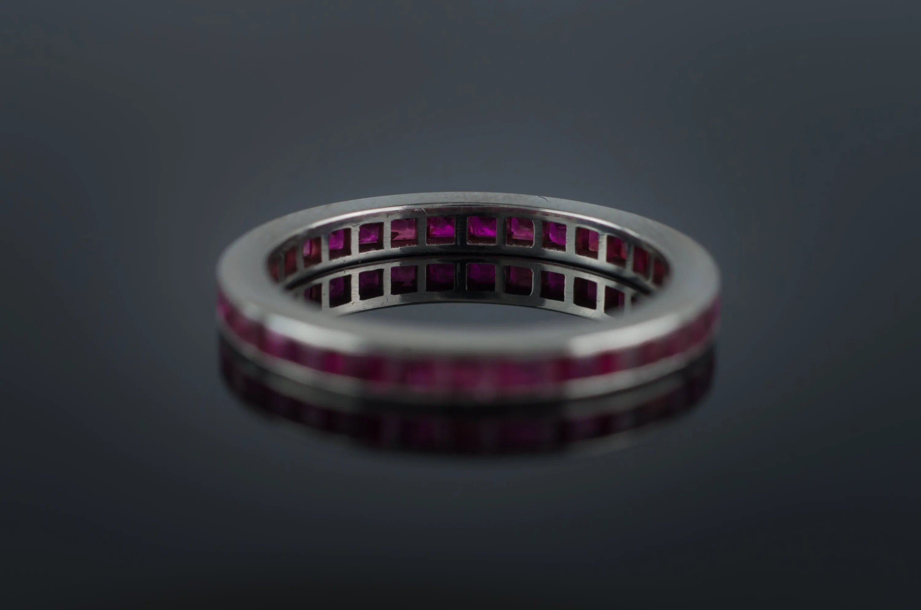 VINTAGE PLATINUM AND RUBY ETERNITY BAND