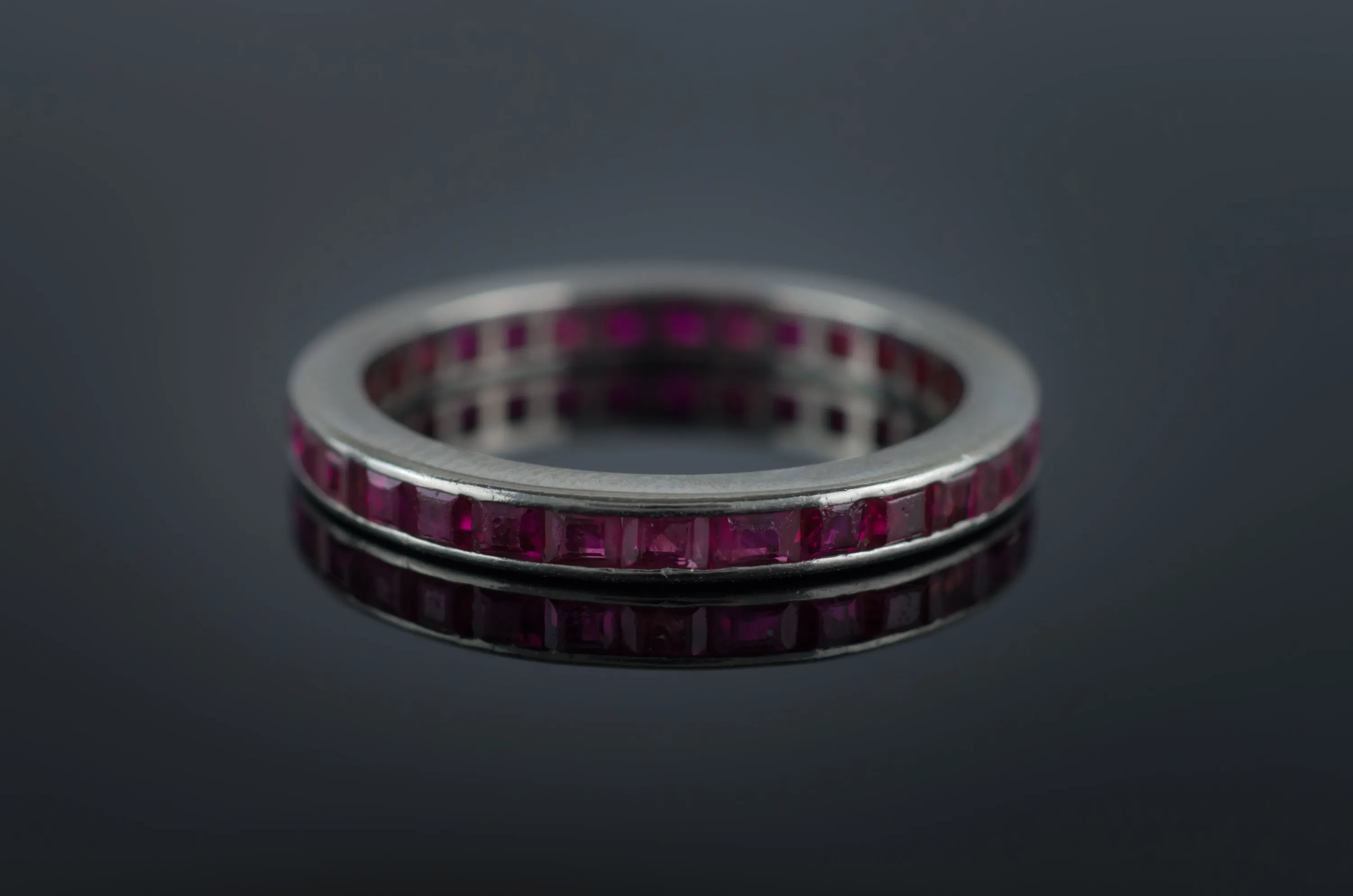 VINTAGE PLATINUM AND RUBY ETERNITY BAND